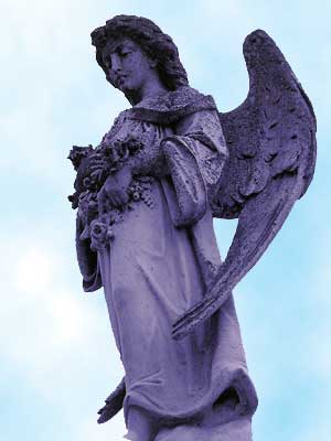 Statue_at_Metairie_Cemetery